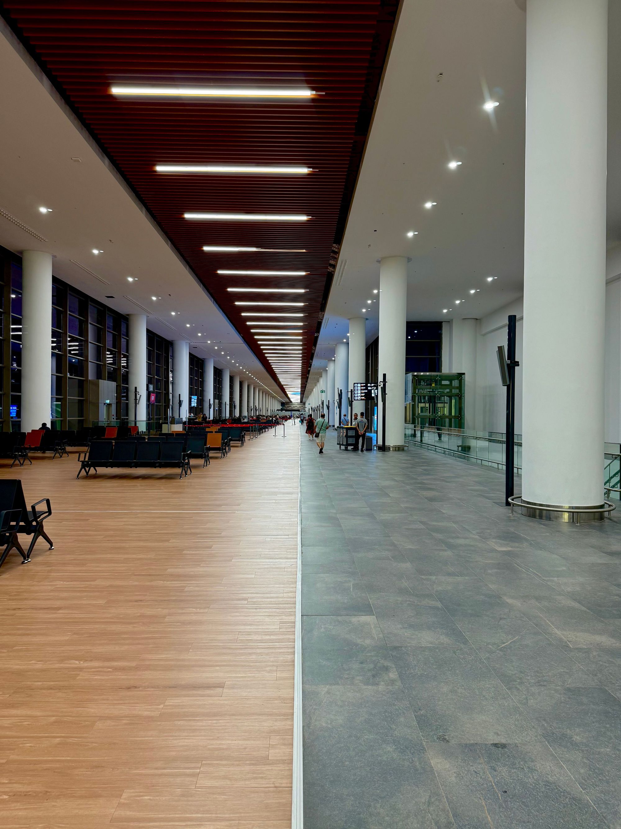A long, empty airport concourse